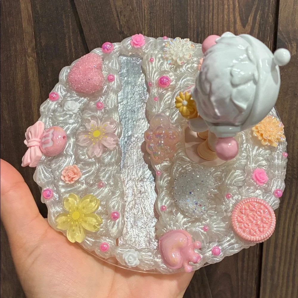Charming Figurine with Candy and Floral Details